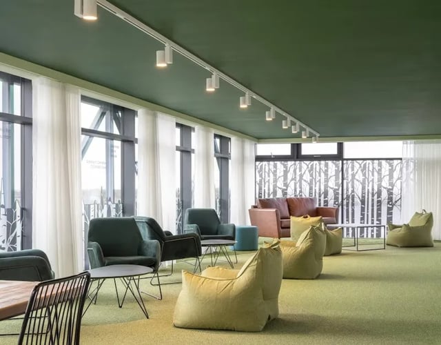 Beanbags armchairs sofa coffee tables living room at Aspen Dublin in Dublin Student Accommodation