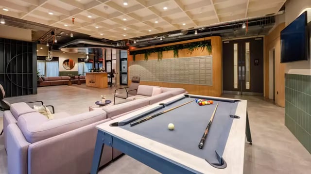 Pool table sofas and mailboxes common area at The Aspen in Leicester Student Accommodation