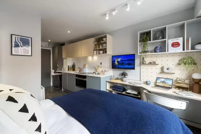 Bed kitchen desk with laptop and TV studio apartment at The Aspen in Leicester Student Accommodation
