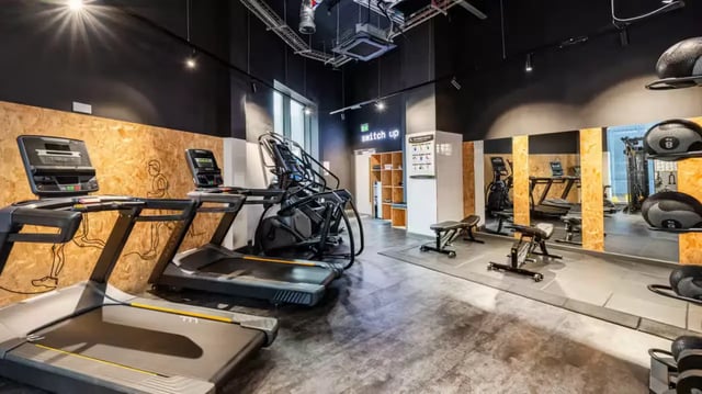 Treadmills stair climber benches weights gym at Compass in Birmingham Student Accommodation