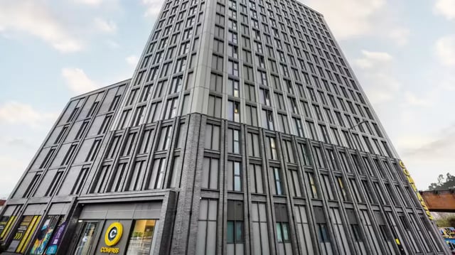 Modern student accommodation building exterior with many windows at Compass in Birmingham Student Accommodation