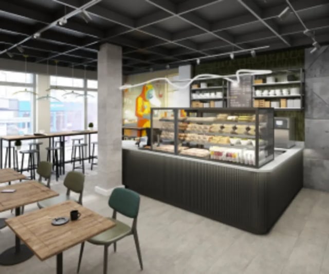 Cafe counter with pastries and seating area cafe at Iconinc The Bonnie in Glasgow Student Accommodation
