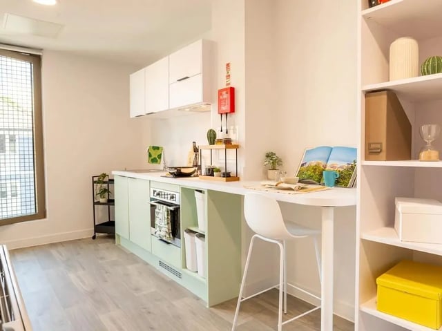Kitchen counter oven and bar stool kitchen at Promenade Student Living in Brighton Student Accommodation