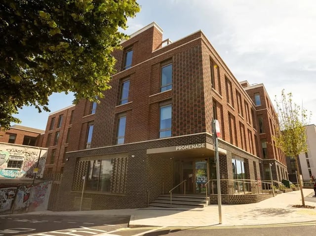 Modern brick student accommodation building entrance exterior at Promenade Student Living in Brighton Student Accommodation