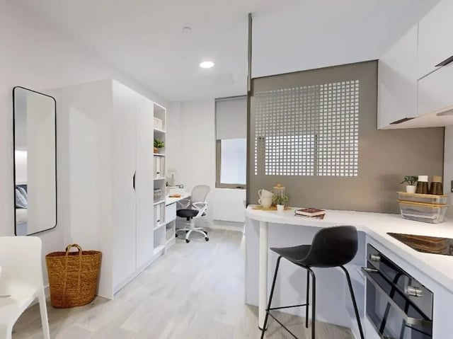 Mirror desk shelves and kitchen counter area kitchen at Promenade Student Living in Brighton Student Accommodation