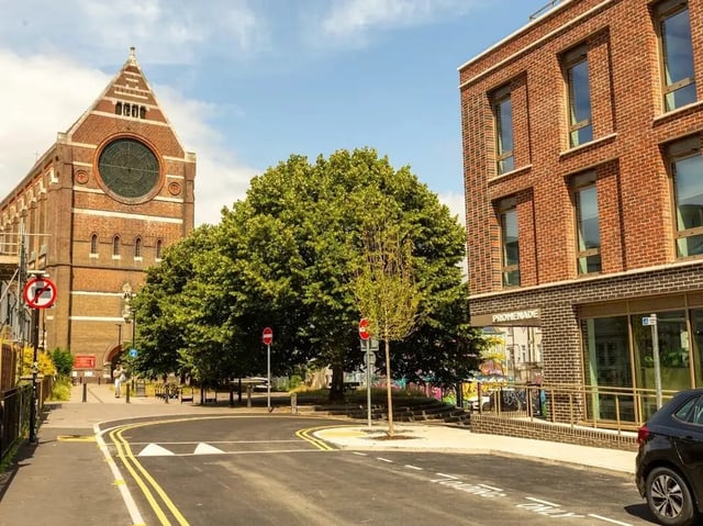 Red brick building with large windows exterior at Promenade Student Living in Brighton Student Accommodation