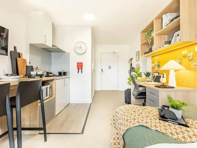 Kitchen desk area and bed studio room at Globe Works in Birmingham Student Accommodation