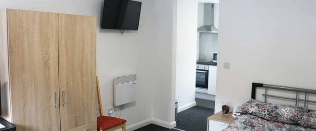 Wardrobe TV heater chair bed kitchen Bedroom at Forest Rise in Loughborough Student Accommodation