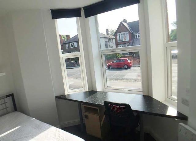 Desk with chair by window bedroom at Forest Rise in Loughborough Student Accommodation