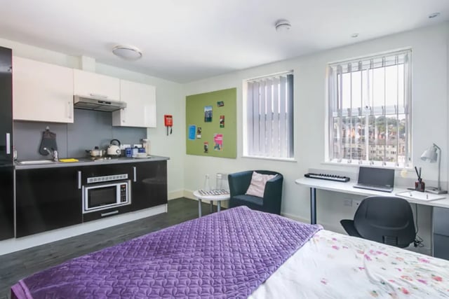 Kitchen desk chair and bed student studio at Ty Ni in Bangor Student Accommodation