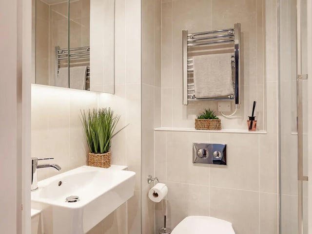 Sink toilet heated towel rack bathroom at Straits Garden in Egham Student Accommodation