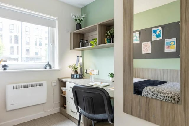Desk with chair shelving and bed study area at Hamwic Hall in Southampton Student Accommodation