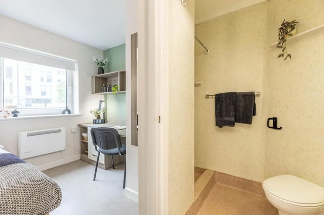 Bed desk and bathroom with toilet and shower at Hamwic Hall in Southampton Student Accommodation