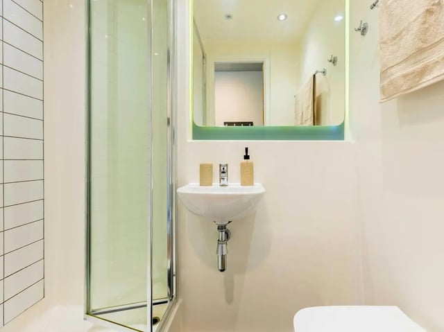 Shower sink mirror towel bathroom at Clifford House in Exeter Student Accommodation