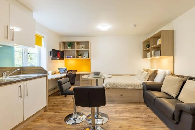 Kitchen desk bed sofa living room at Iron Bridge Studios in Exeter Student Accommodation