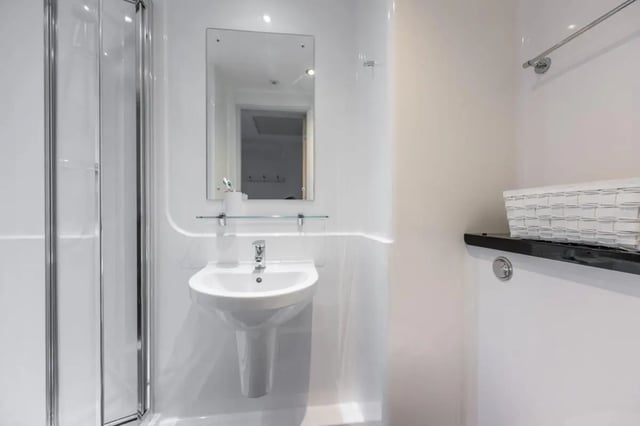 Shower sink mirror toothbrush holder shelf bathroom at Haddington Place in Edinburgh Student Accommodation