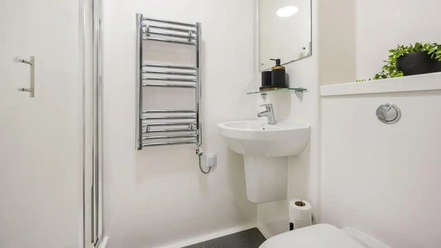 Shower sink towel rack toilet bathroom at Sizer Court in Preston Student Accommodation