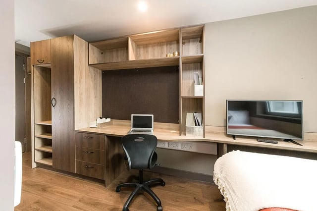 Desk laptop chair storage television bedroom at Ernest Place in Durham Student Accommodation