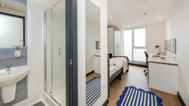 Shower sink bed desk wardrobe bedroom bathroom at Innovo House in Liverpool Student Accommodation