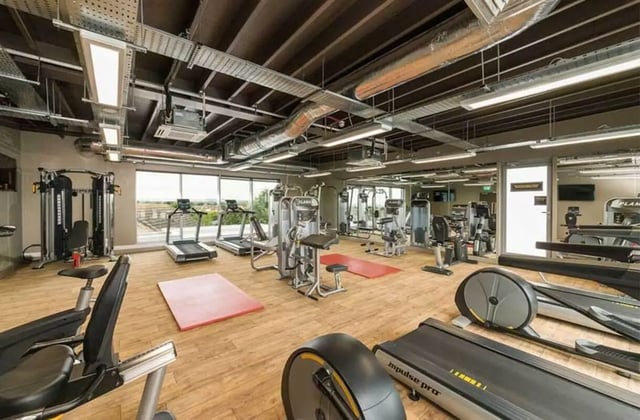Gym equipment treadmills weight machines gym area at Ernest Place in Durham Student Accommodation