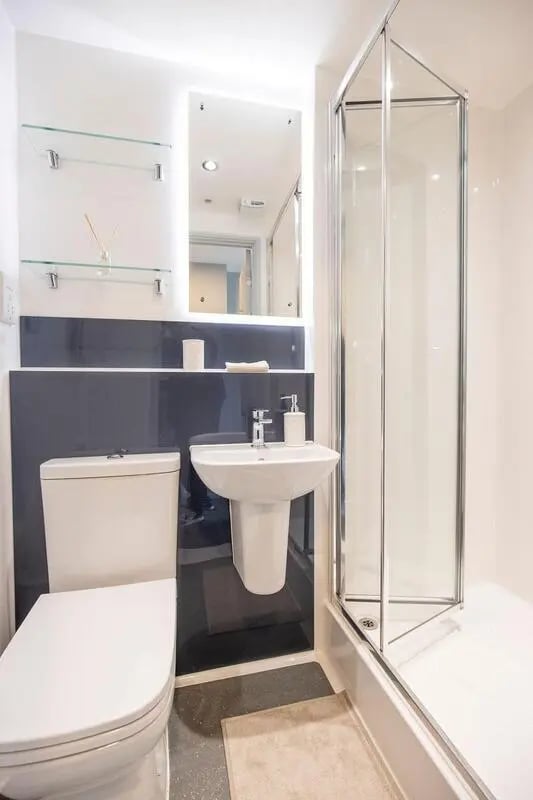 Toilet sink shower with glass enclosure bathroom at Ash Grove Court - Guildford in Guildford Student Accommodation