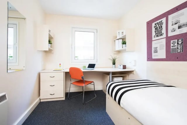 Bed desk chair shelves and mirror bedroom at St Martins House in Leicester Student Accommodation