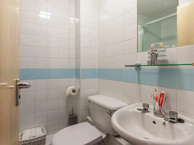 Toilet sink towels and toiletries bathroom at Trinity Student Village in Preston Student Accommodation