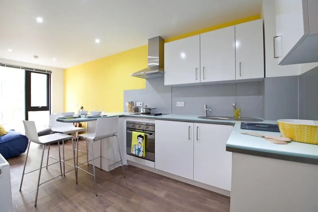 Modern kitchen with white cabinets sink stove kitchen at Gateway Apartments in Edinburgh Student Accommodation