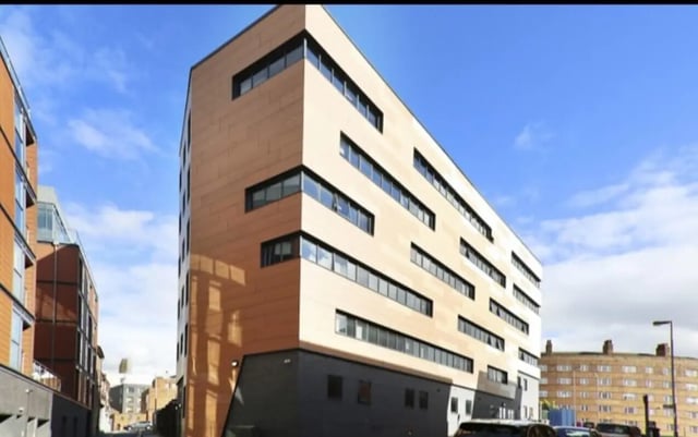 Modern building with many windows exterior at Plato House in Liverpool Student Accommodation