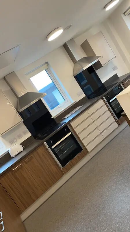 Two ovens with modern hoods window toaster kitchen at Phoenix Place in Liverpool Student Accommodation