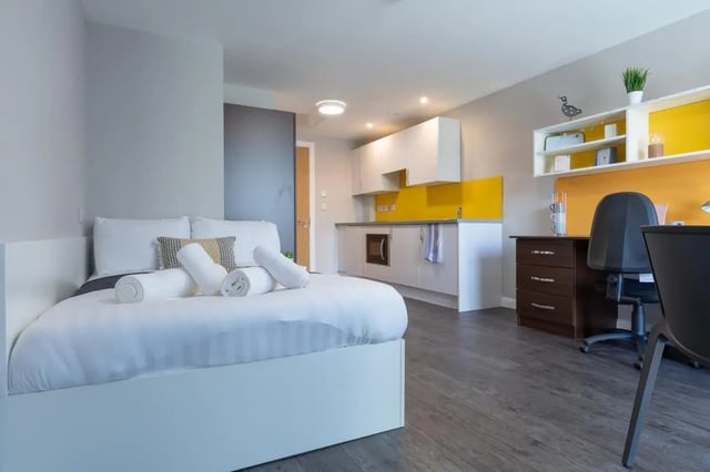 Bed kitchen desk and chair studio apartment at One Islington Plaza in Liverpool Student Accommodation