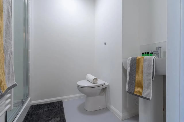 Toilet sink shower and towel Bathroom at One Islington Plaza in Liverpool Student Accommodation