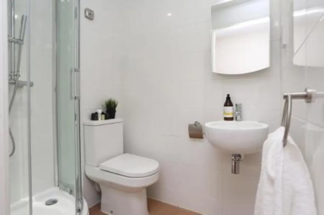 Toilet shower sink towel rack bathroom at Canterbury Student Village in Canterbury Student Accommodation