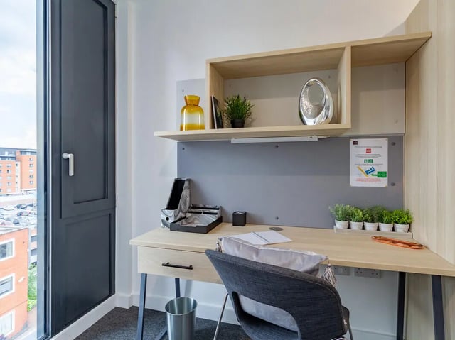 Desk with chair and plants study area at Straits Village in Nottingham Student Accommodation