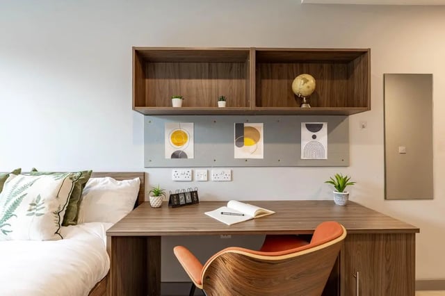 Bed desk globe artwork and chair study area at Scotway House in Glasgow Student Accommodation