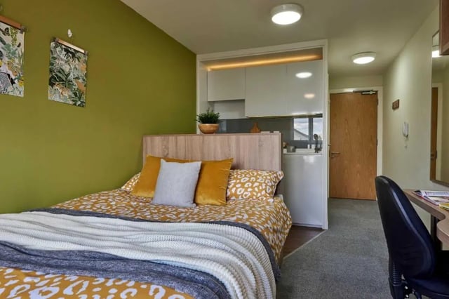 Bed desk and kitchen area studio room at Selly Oak Court in Birmingham Student Accommodation