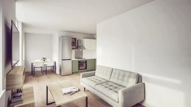 Sofa coffee table kitchen dining area living room at St Chads Student Village in Birmingham Student Accommodation