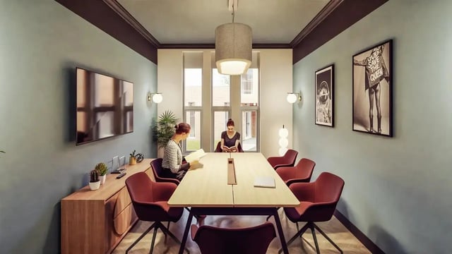Two women at a large table study room at St Chads Student Village in Birmingham Student Accommodation