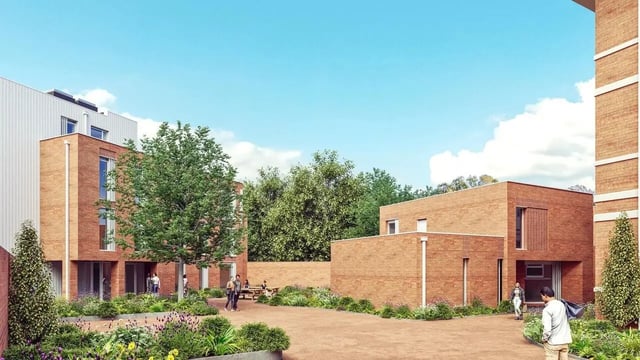 Brick buildings with courtyard and garden exterior at St Chads Student Village in Birmingham Student Accommodation