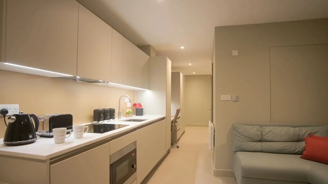 Kitchen with sofa and study desk kitchen at Beechenhurst House in Birmingham Student Accommodation