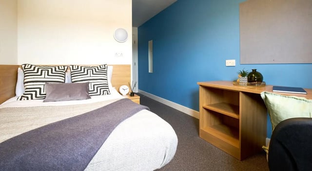 Bed desk and whiteboard bedroom study area at Barker House in Newcastle Upon Tyne Student Accommodation