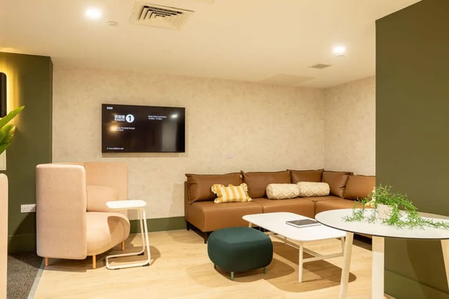 Brown sectional sofa television modern living room at Yugo Crown Place in Birmingham Student Accommodation