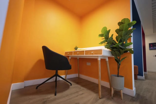 Desk chair plant on wood floor Study area at Aparto Arbury Court in Kingston Upon Thames Student Accommodation