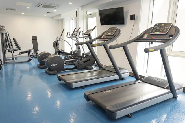 Treadmills ellipticals and weight machines gym at Aparto Arbury Court in Kingston Upon Thames Student Accommodation