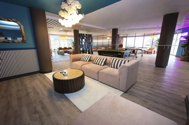 Sofa pool table coffee table living area at Aparto Arbury Court in Kingston Upon Thames Student Accommodation