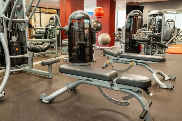 Gym equipment including benches and weight machines Playing area at Marybone Student Village 1 in Liverpool Student Accommodation