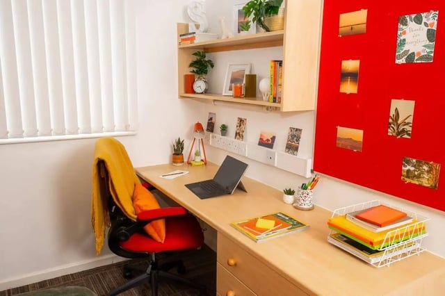 Desk with laptop chair and organized shelves study area at Marybone Student Village 2 in Liverpool Student Accommodation