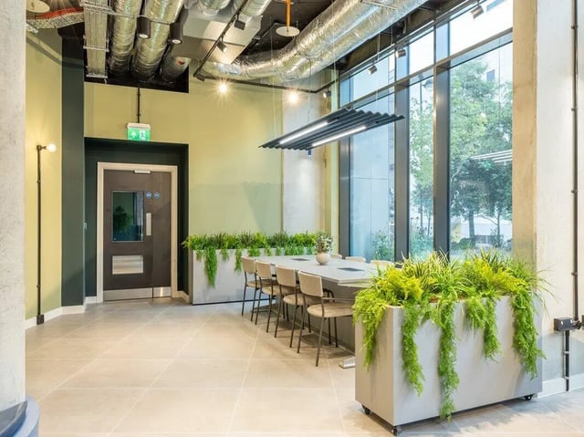 Table and chairs with plants communal area at Sheares Hall in Newcastle Upon Tyne Student Accommodation