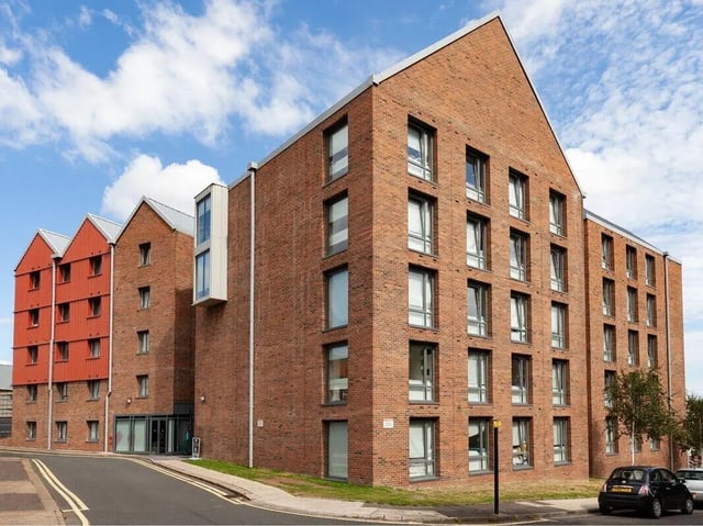 Brick building with red and white exterior sections exterior at Sheares Hall in Newcastle Upon Tyne Student Accommodation