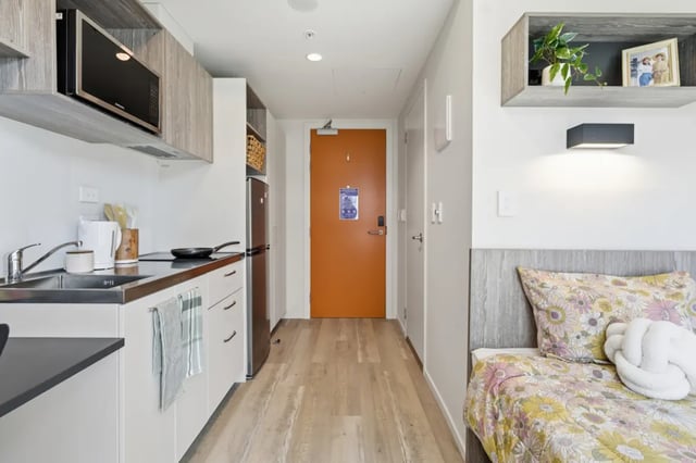 Kitchen area with microwave, sink, and fridge bedroom at Mayoral Drive Student Accommodation in Auckland Student Accommodation